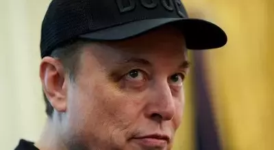 Tesla Faces Headwinds as Musk Warns of Challenging Quarters Ahead