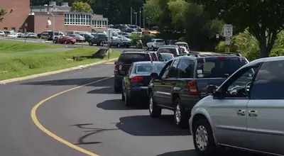 The Perplexing Phenomenon of Protracted School Pick-Up Queues