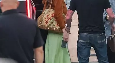 Dakota Johnson's Modern 70s Concert Style