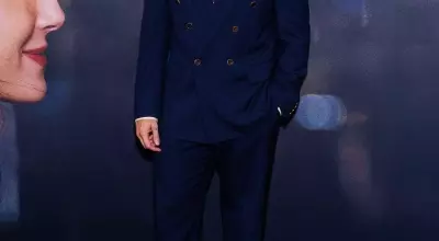 Callum Turner's Stylish Twist on the Classic Navy Suit