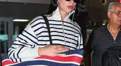 Dua Lipa Redefines Airport Chic with Oversized Chanel Tote