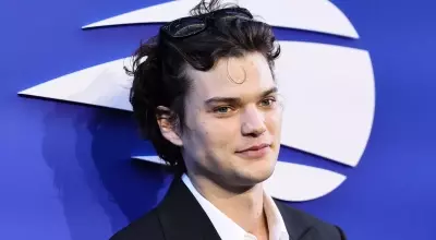 Homer Gere Embraces the Forehead Curl Trend
