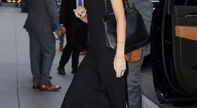 Dakota Johnson's Unexpected Summer Footwear Choice: The Wedge Flip-Flop