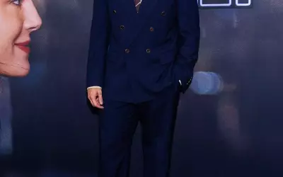 Callum Turner's Stylish Twist on the Classic Navy Suit
