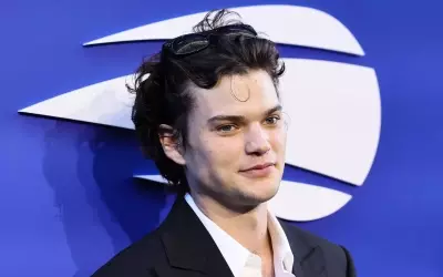 Homer Gere Embraces the Forehead Curl Trend