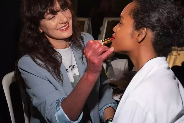 Victoria Beckham Beauty Debuts Bold Red Lip at Paris Fashion Week