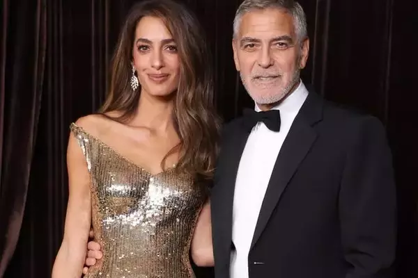Amal Clooney Dazzles in Gold at the Albies