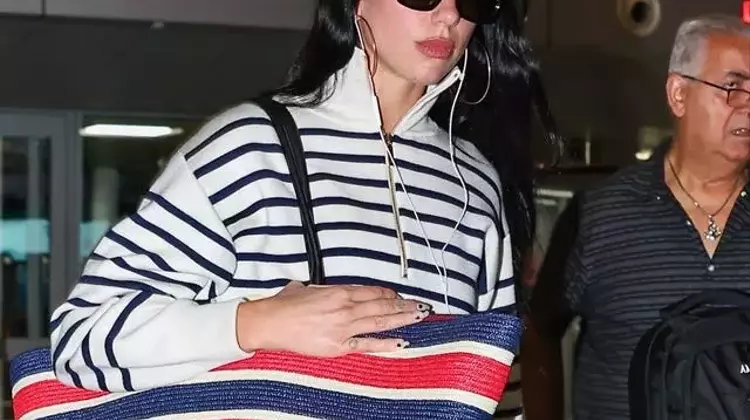 Dua Lipa Redefines Airport Chic with Oversized Chanel Tote